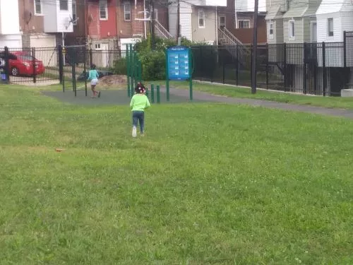 It is a cute little park with a picnic area and exercise stations. The play surface is rubberized and padded